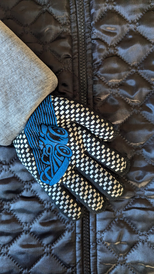 Kids’ quilted jacket with attached black gloves featuring brightly colored fingertip accents in white